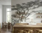 Une cuisine moderne avec des armoires en bois clair et une magnifique tapisserie murale d'arbres en noir et blanc. Une excellente idée tapisserie cuisine pour une ambiance zen.