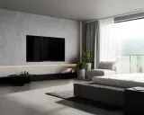 Elegancka ściana z telewizorem w minimalistycznym wnętrzu. Betonowa faktura, dyskretne oświetlenie i widok na góry.