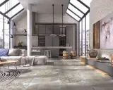Nowoczesny salon z industrialnymi akcentami. Na podłodze piękne, wzorzyste płytki, które dodają charakteru.