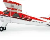 Ein rotes und weißes Modellflugzeug, ein "Beaver Flugzeug", mit der Aufschrift "Westcoast Air" und einer Taube auf dem Heck.
