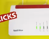 FRITZ!Box mit roten "TRICKS"-Aufkleber. Nützliche FRITZ!Box Tipps für dein Heimnetzwerk.