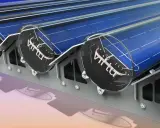Panneau solaire avec des disques transparents et un logo "Virtu". Le tube solaire est intégré dans une structure métallique.