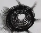 Abstract charcoal mark making examples, featuring a dark, spiraling circle with radiating lines on a white background.