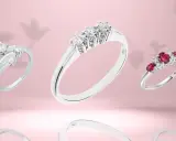 Anelli con diamanti e rubini, un'elegante trilogia che simboleggia passato, presente e futuro.