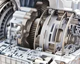 Przekładnia hydrokinetyczna, czyli hydrauliczna skrzynia biegów, z widocznymi kołami zębatymi i elementami sterującymi.