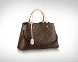 Brązowa torebka Louis Vuitton z monogramem, uchwytami i paskiem na ramię.