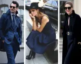 Uomo in abito blu, donna con cappello e gonna blu, donna in cappotto nero. Blu e nero stanno bene insieme, creando look eleganti.
