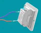 Schéma montrant comment connecter des fils à un nouveau dispositif pour changer interrupteur. Les fils rouge et violet sont guidés vers les bornes L et N.