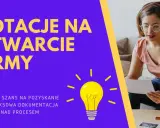 Dotacja z urzędu pracy na otwarcie firmy. Analiza szans, dokumentacja i nadzór nad procesem. Kobieta z tatuażem analizuje dokumenty.