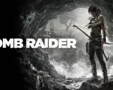 Lara Croft, bohaterka Tomb Raider, stoi na skalistej plaży z łukiem w dłoni, gotowa na przygodę.