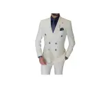 A man models a sharp double-breasted suit in white with subtle pinstripes. He wears a navy shirt and patterned tie, completing the sophisticated look.
