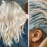 Piękne, falowane włosy w odcieniu perłowy blond, tuż po zabiegu koloryzacji.