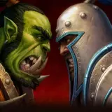 Zacięta konfrontacja orka i człowieka, ikoniczna dla Warcraft: Orcs & Humans.