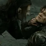 Adar, władca Pierścieni, chwyta za gardło rannego Arona.