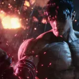 Jin Kazama pronto a combattere in Tekken 8 recensione. Sfondo infuocato e pioggia di scintille.