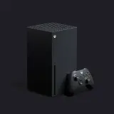 Czarna konsola Xbox Series X i kontroler na ciemnym tle. Premiera nowej generacji gier.