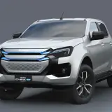 Srebrny Isuzu D-Max EV Concept z niebieskimi akcentami na grillu i reflektorach. Nowoczesny pickup elektryczny.