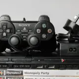 Konsola PlayStation 2 z kontrolerem i grami, idealna do uruchomienia jako ps2 emulator android.