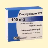 Opakowanie leku Doxycyclinum TZF 100 mg, zawierające 10 kapsułek twardych. Jest to antybiotyk z grupy tetracyklin.