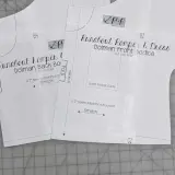 Close-up of a DIY romper pattern for a "Runabout Romper & Dress," showing front and back bodice pieces with instructions like "Cut 1 on Fold" and "Stretch.