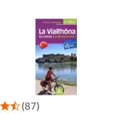 Guía de la ViaRhôna, un recorrido ciclista del lago Lemán al Mediterráneo. Una ciclista pedalea junto al río Ródano.
