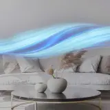 Ondas de aire azul fluyen sobre un sofá moderno, sugiriendo la acción de un ionizador de aire casero purificando el ambiente.