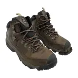 Well-worn brown hiking boots, one with the sole coming off, showing signs of many adventures.