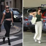 Dwie kobiety prezentują spódnica ołówkowa stylizacje: jedna w czerni z frędzlami, druga w kremowej, z zielonym topem.