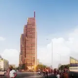 Pomarańczowy wieżowiec o kaskadowej formie, z zielonymi akcentami, dominuje nad ulicą. Zastanawiasz się, ile metrów ma ten wieżowiec?