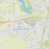 Mapa Poznania z zaznaczoną trasą spacerową, widoczne ulice, parki i jezioro.