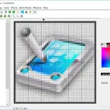 Program do tworzenia ikon, gdzie na siatce pikseli powstaje grafika przypominająca tablet z niebieskim ekranem. Widać różne rozmiary ikon do wyboru.