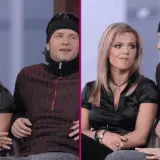 Doda i Majdan siedzą obok siebie, patrząc w różne strony.