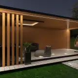 Nowoczesna altana z oświetleniem LED, idealna jako lampa do oświetlenia podwórka. Wygodne meble i huśtawka zapraszają do relaksu.