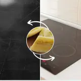 Zniszczona płyta indukcyjna obok czystej, z bananem w środku. Skuteczna ochrona płyty indukcyjnej.