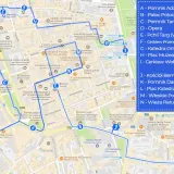 Mapa Lwowa z zaznaczoną trasą turystyczną, obejmującą atrakcje takie jak Opera Lwowska, Plac Potockich, Katedra Ormiańska i Wieża Ratuszowa.