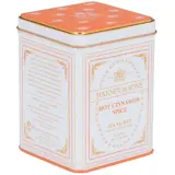 Biała puszka z pomarańczową pokrywką, zawierająca herbatę Harney & Sons Hot Cinnamon Spice. Idealna na chłodne wieczory.