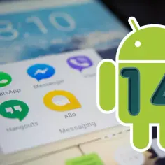 Zielony robot Android z numerem 14 na ekranie telefonu z ikonami aplikacji.