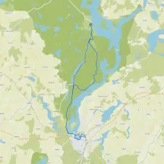 Mapa drogowa z zaznaczoną trasą, która może być najkrótsza trasa do Zakopanego. Widoczne jeziora i lasy.