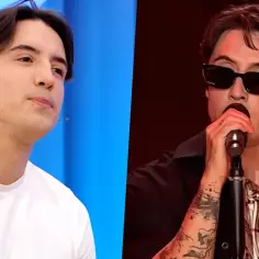 Dawid Kwiatkowski w białej koszulce i na scenie w okularach, z mikrofonem. Czy jego partnerka jest dumna?