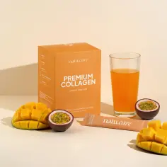 Pudełko "Premium Collagen" o smaku mango-marakuja, szklanka soku, kawałki mango i marakui. Idealny zestaw na orzeźwiający colladrop.