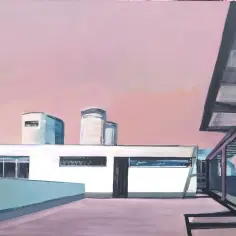 Architektura w stylu modernizm co to? Białe budynki z zaokrąglonymi elementami i przeszklonymi oknami na tle różowego nieba.
