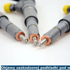 Trzy wtryskiwacze diesla z miedzianymi podkładkami. Uszkodzone podkładki pod wtryskami mogą powodować problemy z silnikiem.