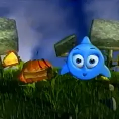 Niebieski, kreskówkowy stworek Kropek z TVN w bajkowej scenerii, wśród trawy i dziwnych budowli.