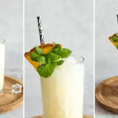 Orzeźwiający drink w kokosie, udekorowany ananasem i miętą, idealny na upalne dni.