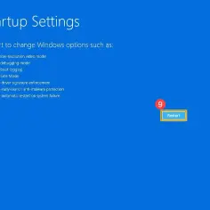 Ekran "Startup Settings" w Windows 11. Wybierz opcję "Restart" (9), aby wejść w tryb awaryjny lub zmienić inne ustawienia startowe.