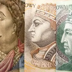 Fragmenty banknotów: portrety królów. Widoczny fragment banknotu 1000 zł z wizerunkiem Władysława Jagiełły.