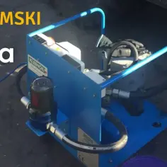 Mobilna stacja do filtrowania oleju domowym sposobem. Urządzenie z niebieską ramą i filtrem.