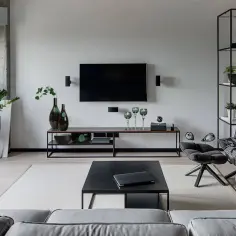 Na komodzie pod telewizorem postawić można eleganckie wazony, kieliszki i zegar.
