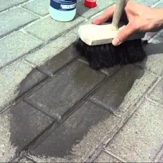 Jak zmyć cement z kostki brukowej - skuteczne metody na plamy
