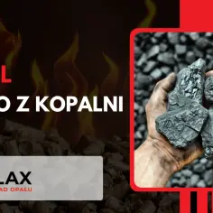 Dłoń trzymająca bryły węgla na tle stosu węgla i płomieni.